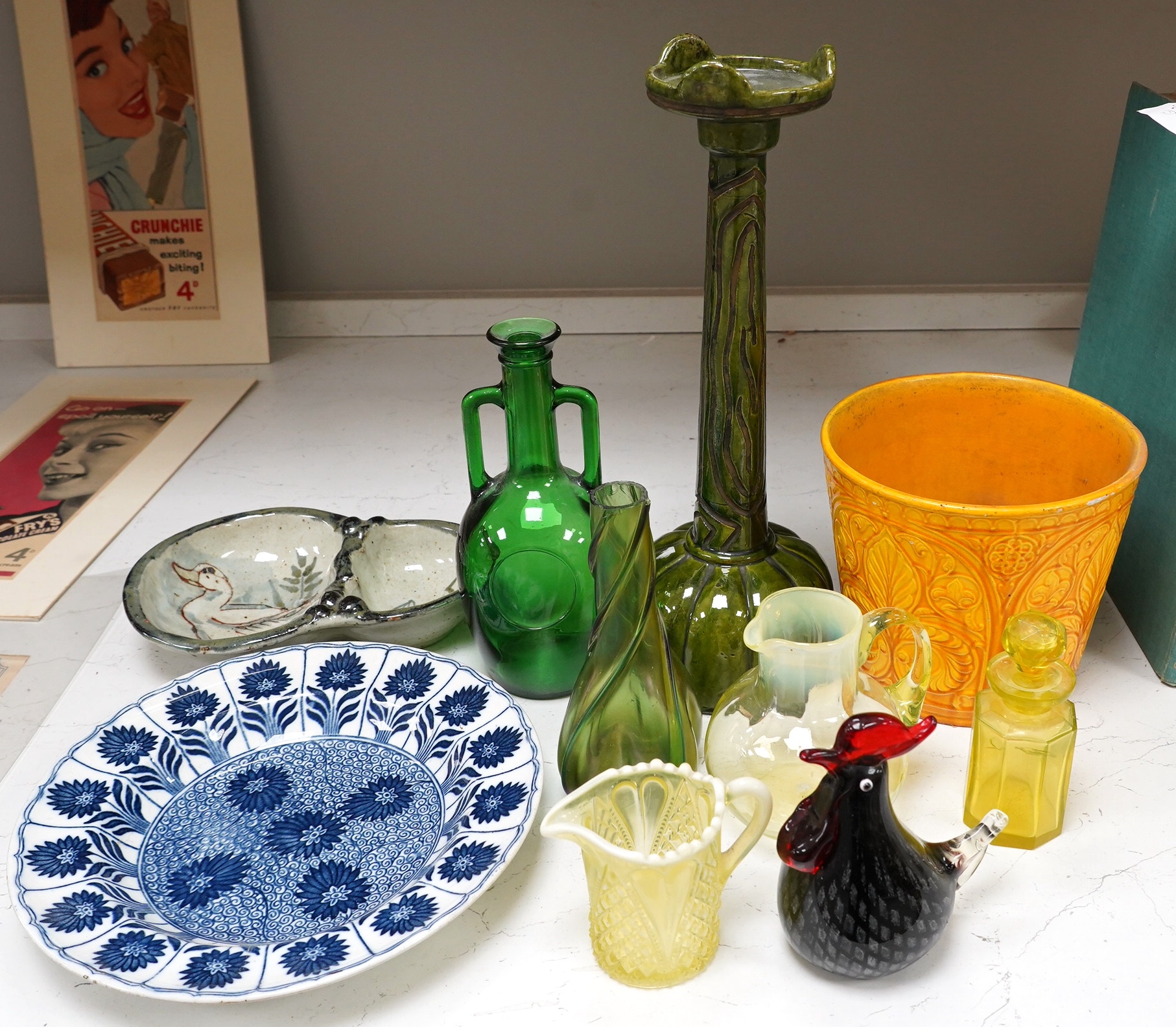 A collection of coloured glassware to include Vaseline examples and a collection of pottery to include a candlestick, a dish and a planter, largest 38cm (10). Condition - mostly fair